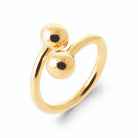 Bague spirale un tour à deux billes d’or croisées en plaqué or