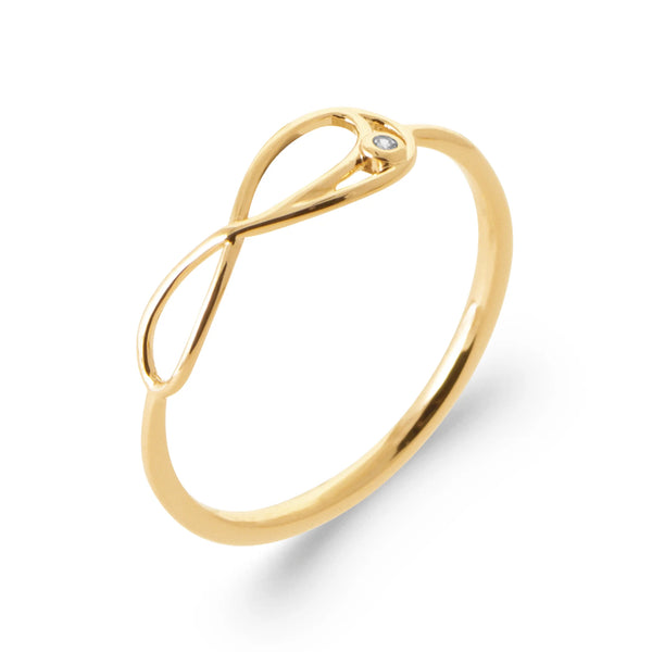 Bague symbole infini en fil d’or et mini zircon en plaqué or, vue de trois quarts