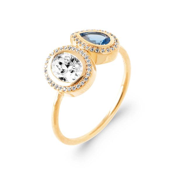 Bague toi et moi zircon ovale et pierre poire bleue en halos en plaqué or, vue de trois quarts