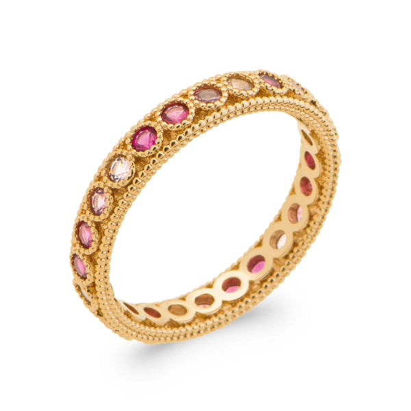 Bague sertie tout autour de pierres camaïeu de roses perlées en plaqué or, vue de trois quarts