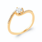 Bague vague croisée et zircon central pavée en plaqué or