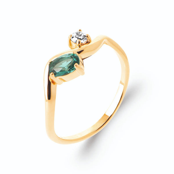 Bague vague pierre vert d’eau et zircon en plaqué or, vue de trois quarts