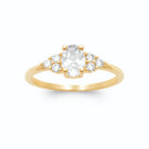 Bague zircon ovale blanc et trios de zircons plaqué or, vue de face