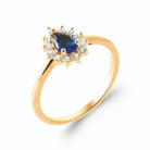 Bague zircon poire bleu outremer et halo blanc en plaqué or