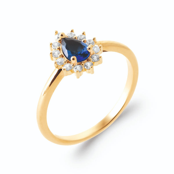 Bague zircon poire bleu saphir et halo blanc en plaqué or, vue de trois quarts