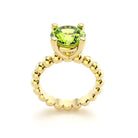 Bague indiscrète pour femme en or jaune et péridot 