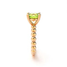 Bague indiscrète pour femme en or rose et peridot