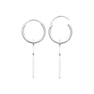Boucles d’oreilles créoles fines à croix longue en argent 925 vu de profil