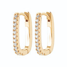 Boucles d’oreilles créoles allongées serties de zircons en plaqué or
