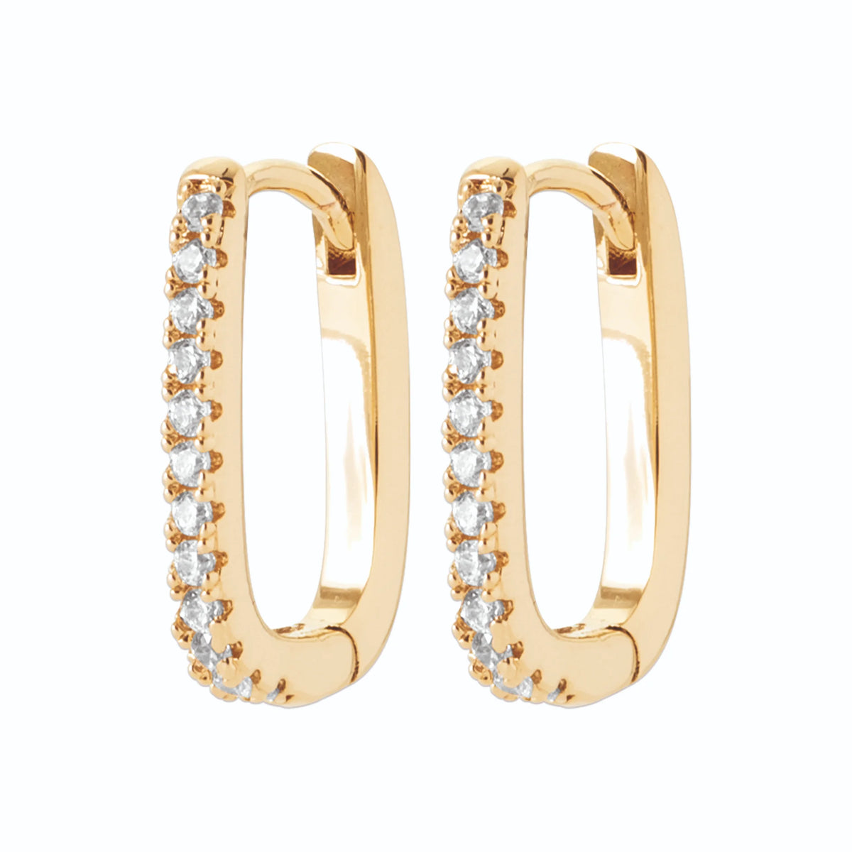 Boucles d’oreilles créoles allongées serties de zircons en plaqué or