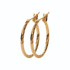 Boucles d’oreilles créoles ciselées 20 mm en plaqué or