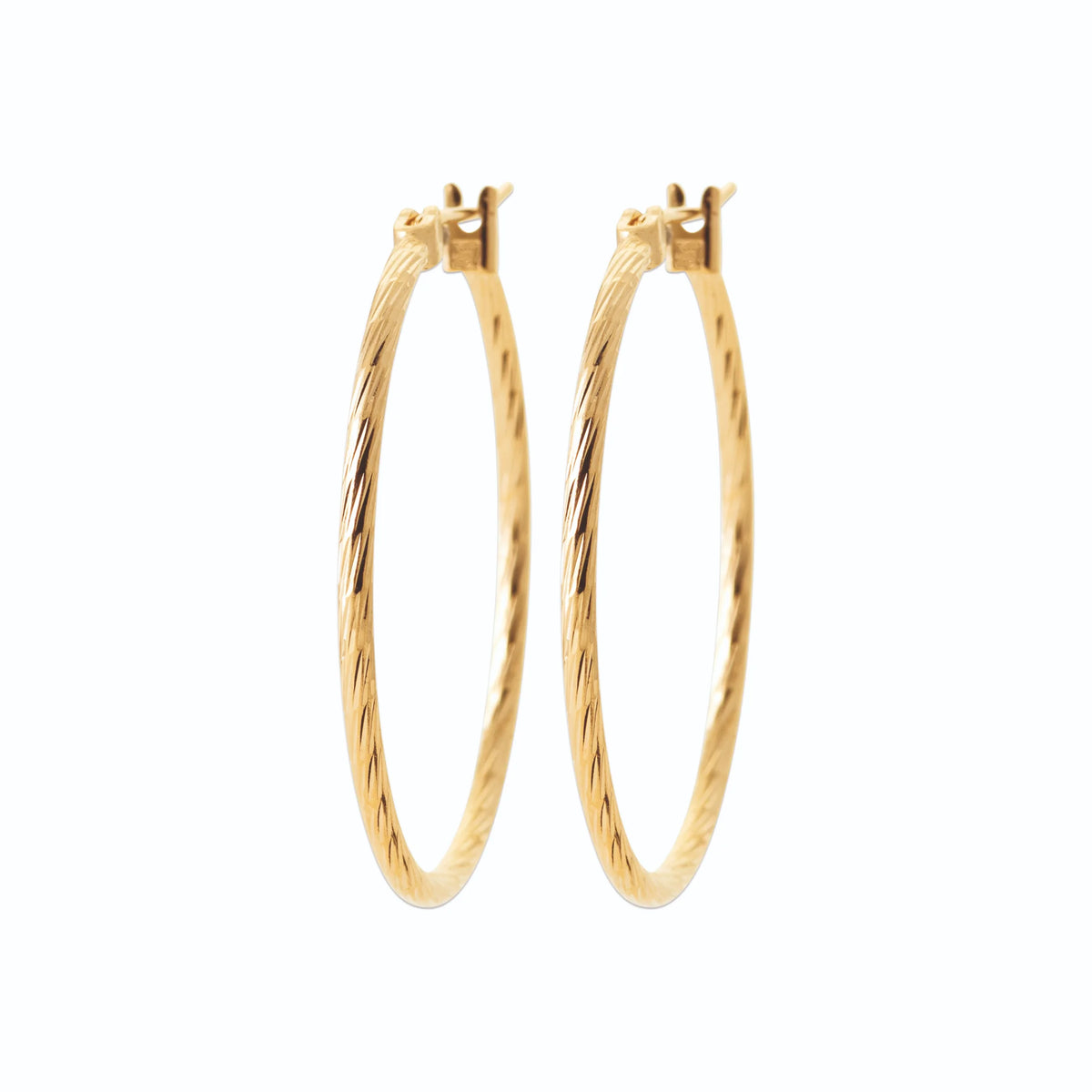 Boucles d’oreilles créoles ciselées 30 mm en plaqué or