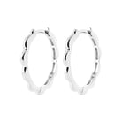 Boucles d’oreilles créoles festonnées moyen modèle en argent 925 rhodié
