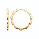 Boucles d’oreilles créoles festonnées moyen modèle en plaqué or