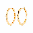 Boucles d’oreilles créoles festonnées moyen modèle en plaqué or