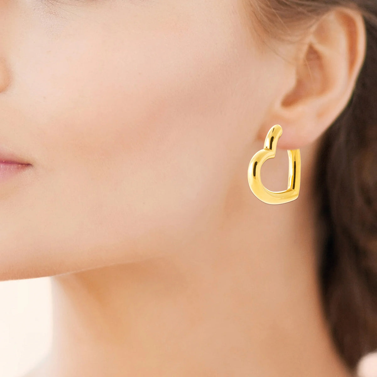 Boucles d’oreilles créoles en forme de cœur en acier PVD doré