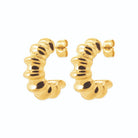 Boucles d’oreilles créoles godronnées en acier PVD doré