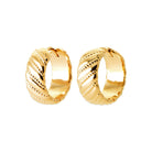 Boucles d’oreilles créoles larges godronnées en biais en plaqué or
