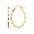 Boucles d’oreilles créoles ovales ondulées grand modèle en plaqué or
