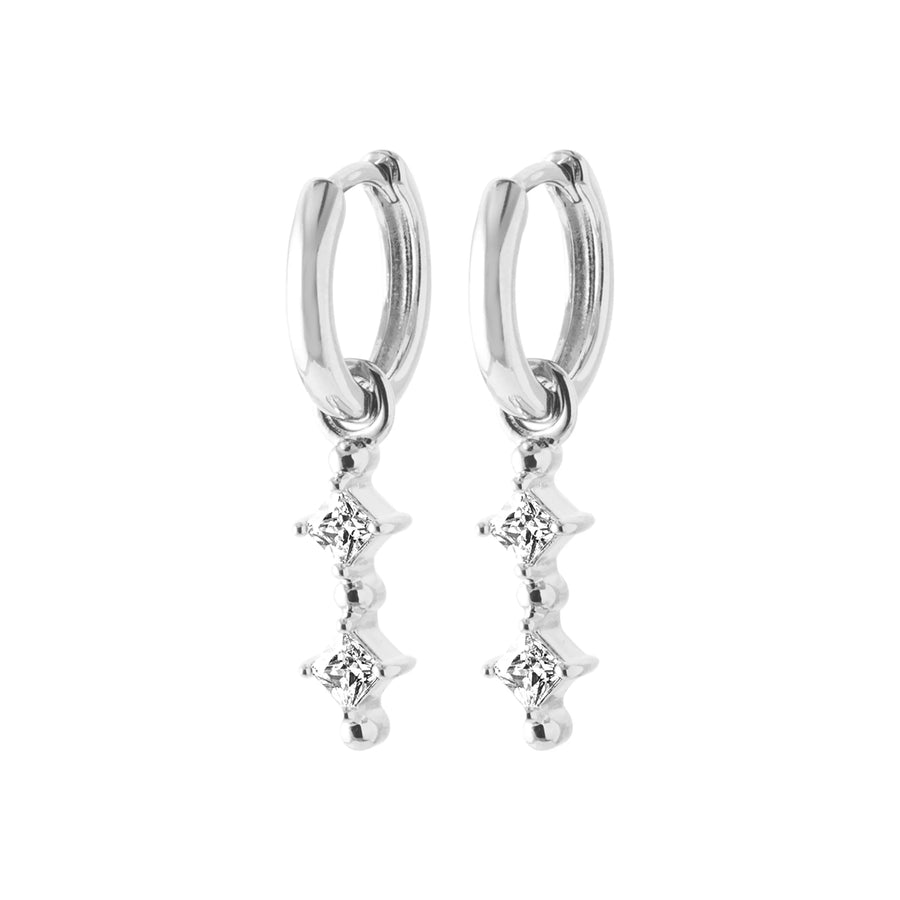 Boucles d’oreilles créoles et pampille trois zircons en argent 925 rhodié, vue de face