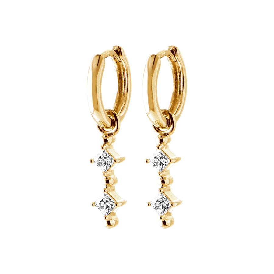 Boucles d’oreilles créoles et pampille trois zircons en plaqué or, vue de face