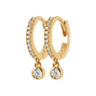 Boucles d’oreilles créoles pavées de zircons et pampille mobile en plaqué or