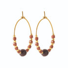 Boucles d’oreilles créoles et perles de pietersite en acier PVD doré