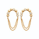Boucles d’oreilles grimpantes arc de zircons et chaînettes drapées en plaqué or