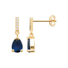 Boucles d’oreilles pendantes barrette de zircons et goutte bleu nuit en plaqué or