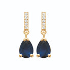 Boucles d’oreilles pendantes barrette de zircons et goutte bleu nuit en plaqué or