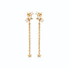 Boucles d’oreilles pendantes étoiles de zircons et chaînette en plaqué or