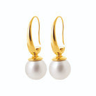 Boucles d’oreilles pendantes fil effilé et grosse perle d’imitation en acier PVD doré