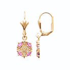 Boucles d’oreilles pendantes fleur de pierres roses en plaqué or