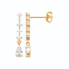 Boucles d’oreilles pendantes ligne de zircons baguettes et poire en plaqué or