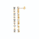 Boucles d’oreilles pendantes longue ligne de zircons alternés en plaqué or