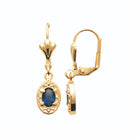 Boucles d’oreilles pendantes ovale perlé et pierre bleu nuit en plaqué or