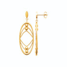 Boucles d’oreilles pendantes ovales emboîtés et billes en acier PVD doré