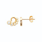 Boucles d’oreilles puces arc de zircons sertis clos en plaqué or