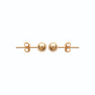 Boucles d’oreilles puces boule grande en plaqué or, vue de profil