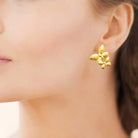 Boucles d’oreilles puces bouquet de feuilles et fleurs en acier PVD doré