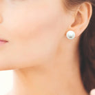 Boucles d’oreilles puces grosse perle d’imitation en acier PVD doré