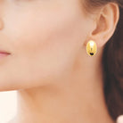 Boucles d’oreilles puces ovale bombé en acier PVD doré