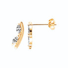 Boucles d’oreilles puces vague courbe et zircons navettes en plaqué or