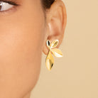 Boucles d’oreilles trio de feuilles en acier PVD doré