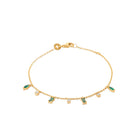 Bracelet chaîne à pampilles de baguettes vertes et zircons en plaqué or