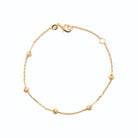 Bracelet chaîne fine à billes diamantées espacées en plaqué or