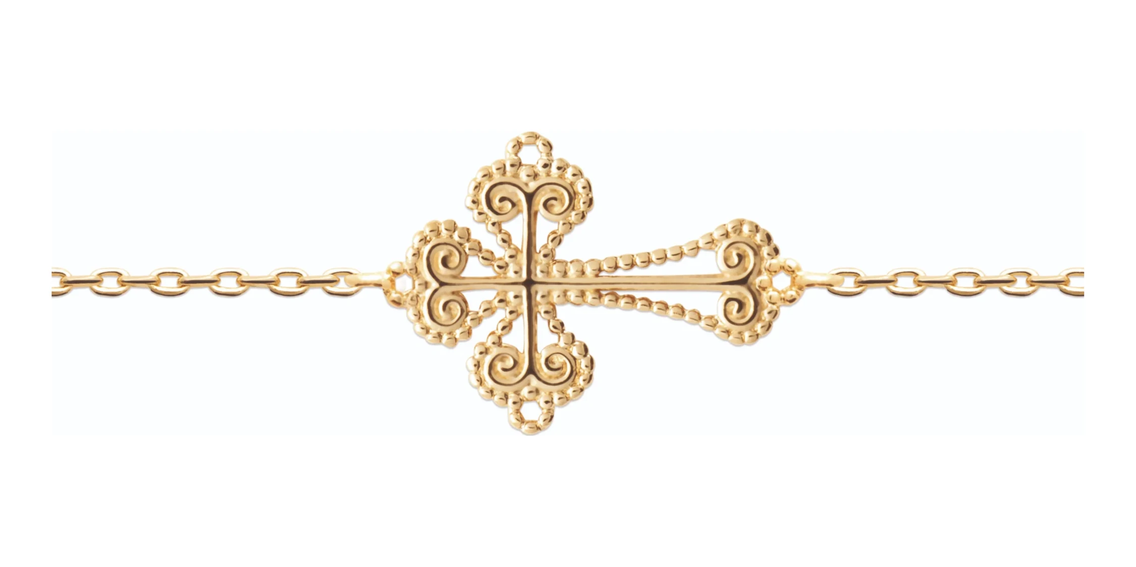 Bracelet chaîne fine à croix filigranée en plaqué or en détail