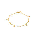 Bracelet chaîne fine à pierres rondes suspendues en plaqué or