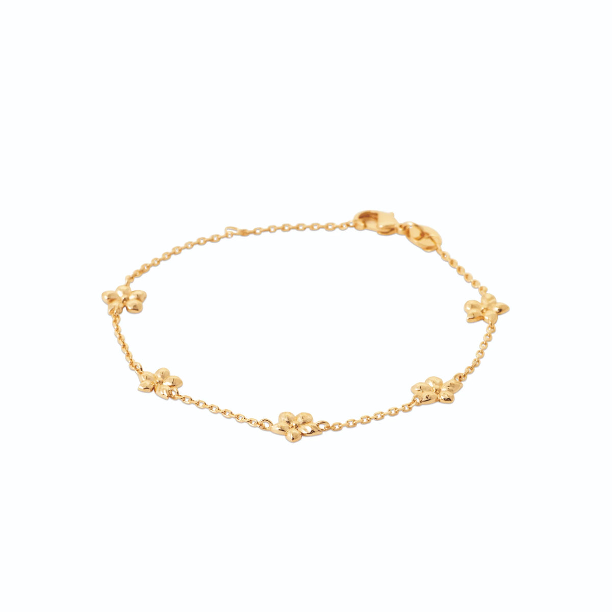Bracelet chaîne fine à stations de petites fleurs en plaqué or