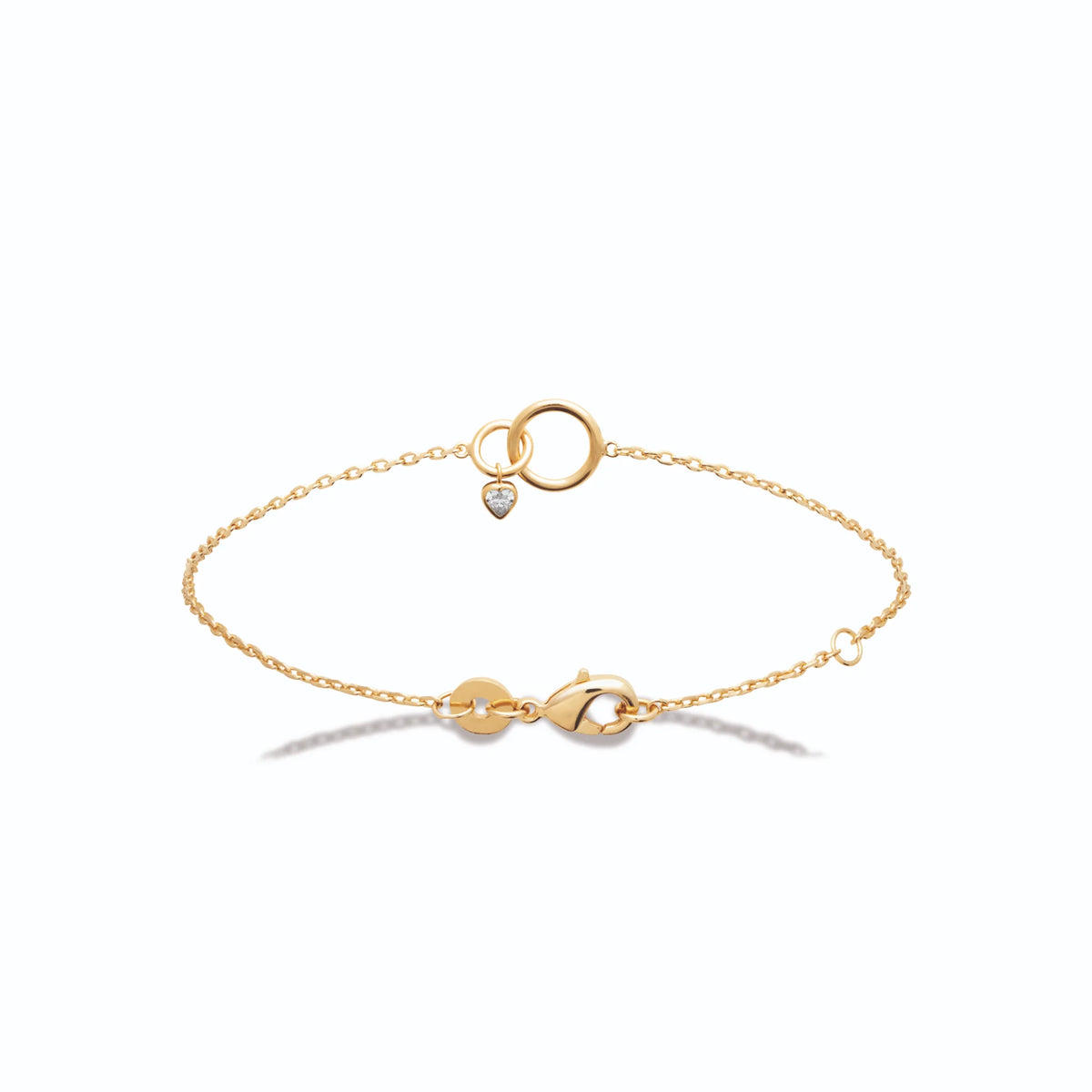 Bracelet chaîne fine anneaux entrelacés et zircon cœur en plaqué or